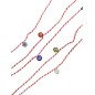 Bracelets grecs à échanger entre amis pour le 1er mai rouge-blanc et des petites fleurs en verre " 5